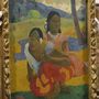 Dos empleados instalan «Nafea Ipoipo faa» de Gauguin en el Museo Reina Sofía