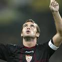 Sevilla's Kerzhakov celebrates after scoring against AEK Athens at Olympic stadium in Athens