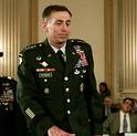 U.S. Army General David Petraeus, the top commander of U.S. forces in Iraq, checks out the room as he prepares to he testify before the U.S. House Armed Services Committee on Capitol Hill in Washington