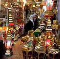 Palestinian women are seen at Ramadan decorated shop in Jerusalem's Old City