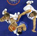 Germany's Nowitzki and Jagla fight for a rebound with Iyaly's Bagnani during their second round game at the European Basketball Championships